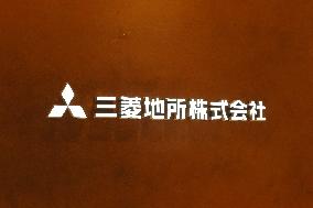 Mitsubishi Estate signboard and logo